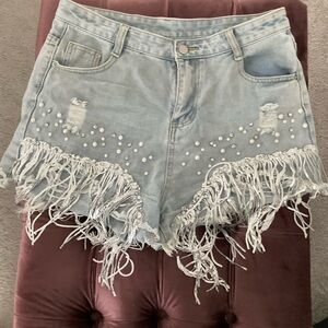 High waist denim shorts with tassels and beading